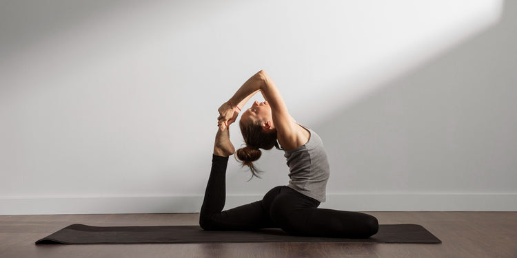 Girl doing yoga on a Soulflex yoga mat.