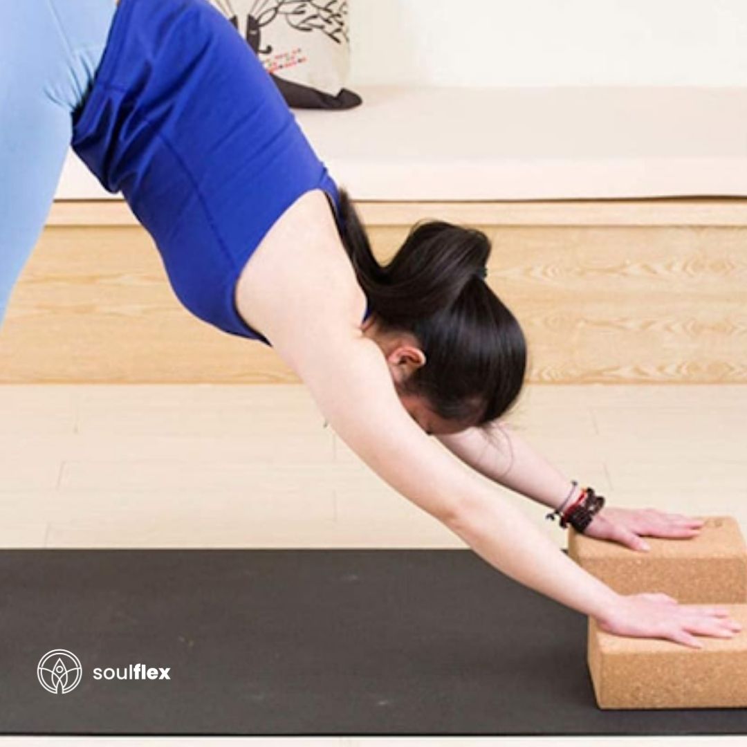 Soulflex High-Density Cork Yoga Block, premium single piece yoga brick designed for men and women. Ideal yoga accessory to improve posture, balance, and performance during asanas. Measures 3x6x9 inches, providing sturdy support for various yoga poses. Durable, eco-friendly cork construction ensures long-lasting use in home and studio workouts.