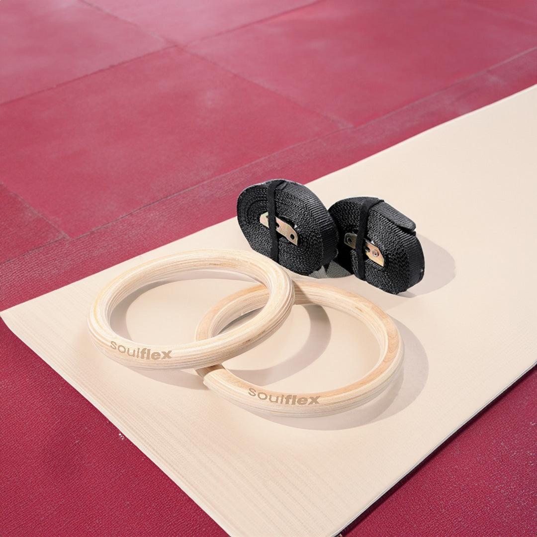 Soulflex Gymnastic Rings for bodyweight exercises, calisthenics fitness equipment for men, women, and children. Roman rings for home and gym workouts, featuring heavy-duty straps and premium wood for durability and performance.